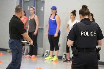Women take the Windsor police prep test that simulates a real physical exam during the application process, May 8, 2015. (Photo by Jason Viau)
