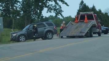 Vehicle hits the ditch at Queens St. and Lakeshore Rd. near Camlachie June 29, 2015 (BlackburnNews.com Photo by Briana Carnegie)