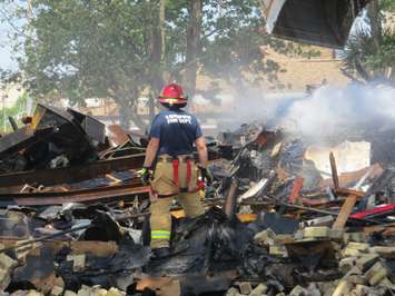 London firefighters continue to douse hotspots after a fire reduced the former Hook's Restaurant at Wharncliffe and Southdale to rubble, May 30, 2018. (Photo by Miranda Chant, Blackburn News) 
