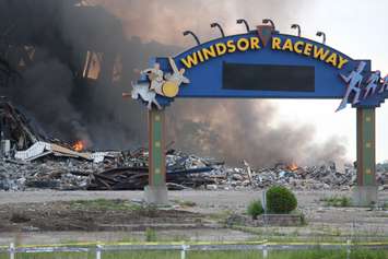 Fire smolders at Windsor Raceway July 1, 2015. (Photo by Adelle Loiselle)