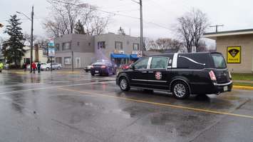 Crowds lined Michigan Ave. Monday to remember former Pt. Edward Mayor Dick Kirkland. December 21, 2015 (BlackburnNews.com Photo by Briana Carnegie)