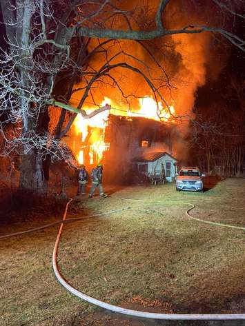House fire just outside of Thamesville. Friday, December 16, 2022. (Photo via CKFES)