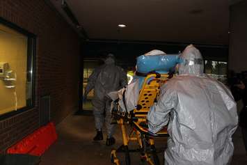 EMS and WRH staff conduct drill of a mock Ebola patient scenario. (Photo by Maureen Revait) 