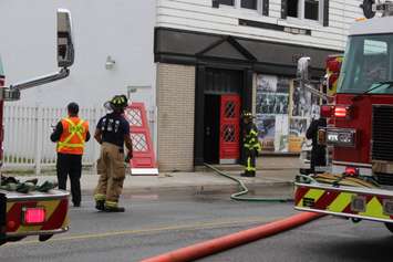 Firefighters at the scene of an apartment fire at the corner of Wyandotte St. E and Gladstone Ave. in Windsor, May 20, 2017.  (Photo by Adelle Loiselle)
