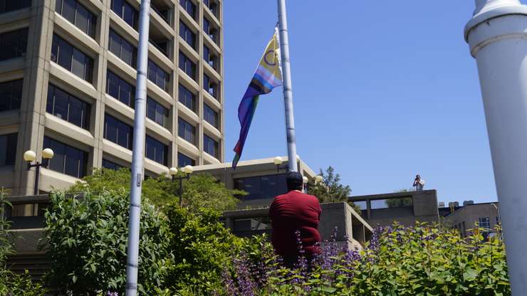Pride flag being raised at Seaway Centre Parkette on May 31, 2024 (Photo by: Lindsay Newman/ Blackburn Media)
