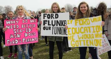 A. B. Lucas secondary school students hold protest signs during student walk outs, April 4, 2019. (Photo by Miranda Chant, Blackburn News)