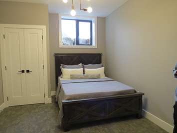 The downstairs bedroom inside the Dream Home at 2162 Ironwood Rd. (Photo by Miranda Chant, Blackburn News)