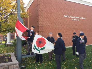 Branch 62 members, Sarnia police officers and Mayor Mike Bradley  gather to raise a Lest We Forget Flag. November 1, 2016 BlackburnNews.com photo by Melanie Irwin