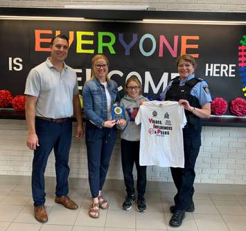 Pictured are Mr. Bacik – Principal, Mrs. Hopper – Grade 5 Teacher/Wheatley Optimist Club, Jordan Lefaive and Special Constable Koldyk of the Chatham-Kent Police Service. (Photo courtesy of the Chatham-Kent Police Service)