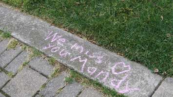 Message in chalk left on Museum Square in honour of teenage girl lost to suicide, June 7, 2016. (Photo by Miranda Chant, Blackburn, News)