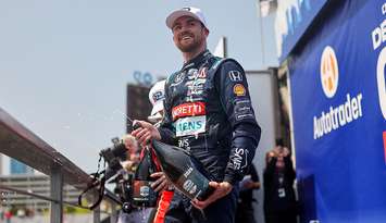 Kyle Kirkwood after winning the 2025 Chevrolet Detroit Grand Prix. (Photo via IndyCar Series)
