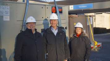 (From left to right) MPP Bob Bailey alongside Tim Bechard and Karen McClintock of Pathways. 21 December 2022. Photo by Blackburn Media.  