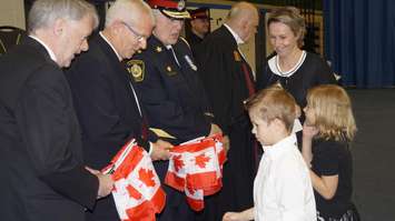 Svezlana Alekseeva and her children receive their Certificate of Canadian Citizenship during a swearing in ceremony at St. Patrick's High School. May 3, 2017 (Photo by Melanie Irwin)