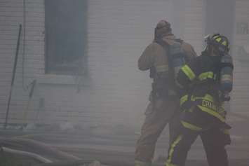 Windsor fire crews battle a blaze at 1574 Gladestone Ave., April 7, 2015. (Photo by Jason Viau)