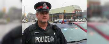 Constable D'Arcy Bruce of the London Police Service at the intersection of Oxford and Richmond streets in London, September 12, 2019. (Photo by Miranda Chant, Blackburn News)
