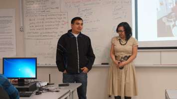 Mayor from El Salvador Rafael Tejada addresses full class of Lambton College Information Technology Professional students. College Professor Delores Quintanilla translates his message to English. April 13, 2016 (BlackburnNews.com Photo by Briana Carnegie)