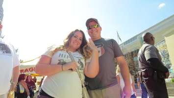 Hilary Davis and Dom Avallone from New York credit the Tragically Hip for their recent engagement. The couple came to London to attend the band's concert, August 8, 2016. (Photo by Miranda Chant, Blackburn News)