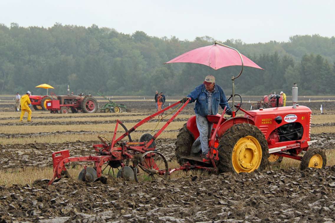 Tractor plowing through field. (Photo courtesy www.plowingmatch.org)
