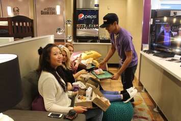 The Steakcation winners being served dinner/dessert by their butler. October 17, 2016. (Photo by Natalia Vega)