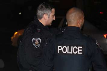 Windsor police investigate a shooting at 187 Oak St. in Windsor on December 23, 2015. (Photo by Ricardo Veneza)