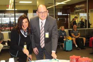 Air Transat business development manager Charlotte Antill and Windsor Mayor Drew Dilkens, December 21, 2015.  (Photo by Adelle Loiselle)