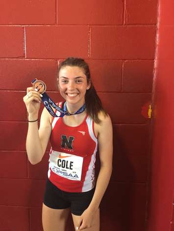 Track & field athlete and Northern student Jaelyn Cole shows off her OFSAA medal (Submitted photo).