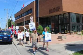 A teachers rally in front of the GECDSB office in Windsor, June 16, 2015. (Photo by Mike Vlasveld) 