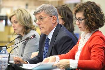 Acting board chair Alan Halberstadt, left, and trustee Jessica Sartori talk about school closures, October 13, 2015. (Photo by Jason Viau)