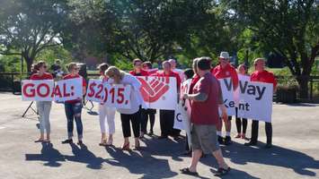 United Way staff hold signage during the campaign launch in Chatham-Kent (Photo by Jake Kislinsky)