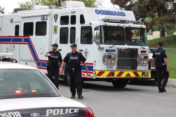 The Emergency Command Unit arrives on the scene of an apparent homicide in the 500 block of Brant St. (Photo by Jason Viau)