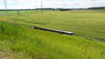 The scene of a crash involving a tractor trailer on highway 401, June 23 2015 (Photo by Jake Kislinsky)