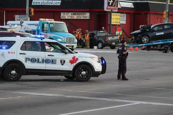 Emergency crews respond to a crash at the intersection of Huron Church Rd. and Tecumseh Rd. W, July 21, 2015. (Photo by Jason Viau)