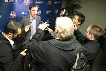 Erie Otter center Connor McDavid speaks with the media after beating the Windsor Spitfires on March 19, 2015. (Photo by Jason Viau)