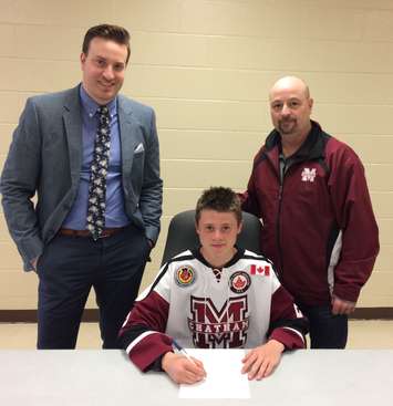 Lucas Fancy (centre) poses for a photo with Chatham Maroons head coach Kyle Makaric (left) and Maroons General Manager Kevin Fisher (right). (Contributed photo)