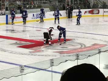 Sens centre Matt Duchene and Leafs centre John Tavares take the ceremonial faceoff prior to the game, with Lucan Mayor Cathy Burghardt-Jesson doing the honours. (Photo by Ryan Drury)