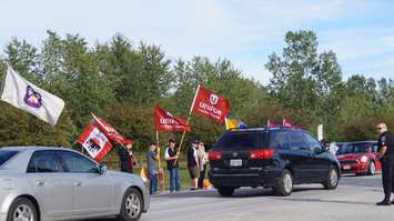 Protesters at Stephen Harper campaign rally at LamSar Sept. 20, 2015 (BlackburnNews.com photo by Dave Dentinger)