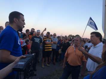 Unifor Local 200 president and the Conservative candidate for Essex Jeff Watson face off at a rally in Essex on September 23, 2015. (Photo by Ricardo Veneza)