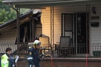 Officials from the Office of the Ontario Fire Marshal are investigating a house explosion in the 1400-block of Francois Rd. in Windsor, October 21, 2015.  (Photo by Adelle Loiselle)