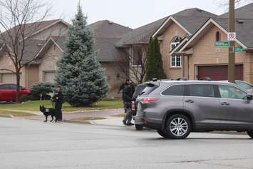 Windsor police ESU surround house in east Windsor to serve an outstanding arrest warrant, December 1, 2015. (Photo by Maureen Revait) 
