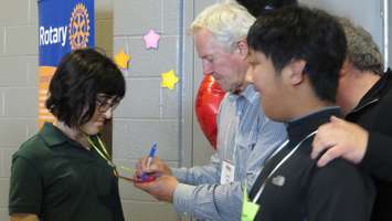 Former Toronto Maple Leafs Captain Darryl Sittler signs autographs at the We're All Stars Celebration in London, February 23, 2016. Photo by Miranda Chant.