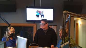 George Hayes, morning host for 99.9 The Fox, wears beer goggles before testing his impaired driving skills. Dec. 12, 2017. (Photo by Colin Gowdy)