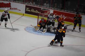 Windsor Spitfires winger Cristiano DiGiacinto mixes it up in the crease against the Erie Otters at the WFCU Centre on September 22, 2016. (Photo by Ricardo Veneza)