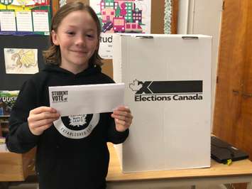 King George VI Grade 4/5 student Eli Maidman holds a ballot for their mock municipal election. October 21, 2022 Image courtesy of Susan Shaw.
