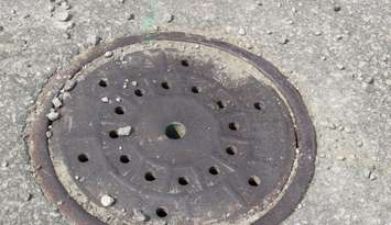 A manhole cover.  (Photo by Adelle Loiselle.)