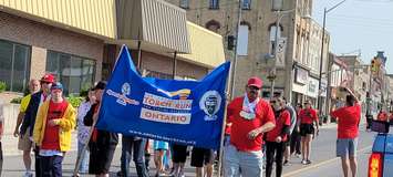 The Torch Run for Special Olympics Ontario begins in Wingham.  Photo by Janice MacKay