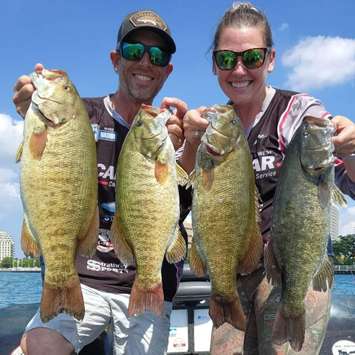 Aaron Hathaway and Natalie Hathaway show off some fish at the Great Lakes Super Series at Sarnia Bay.  6 August 2022. (Photo by Great Lakes Super Series)