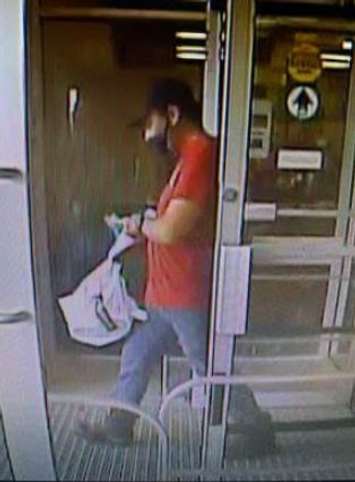 Police look to identify this man as part of a fraud investigation. September 10, 2020. (Photo courtesy of CKPS)
