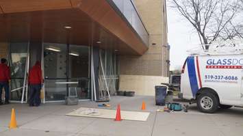 Workers replacing broken windows at St. Patrick's Catholic High School in Sarnia. 5 November 2020. (BlackburnNews.com photo by Colin Gowdy)