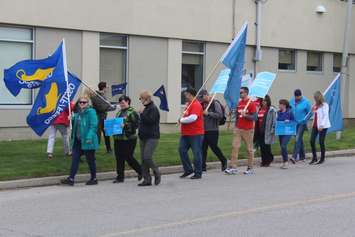 Dozens gather in Chatham on Tuesday, April 30, 2019 to rally against provincial funding cuts to education. (Photo by Allanah Wills) 