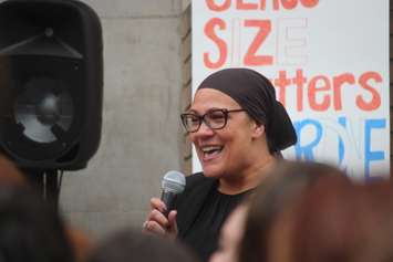 Community activist Remy Boulbol speaks outside Walkerville Collegiate School on April 4, 2019. Photo by Mark Brown/Blackburn News.